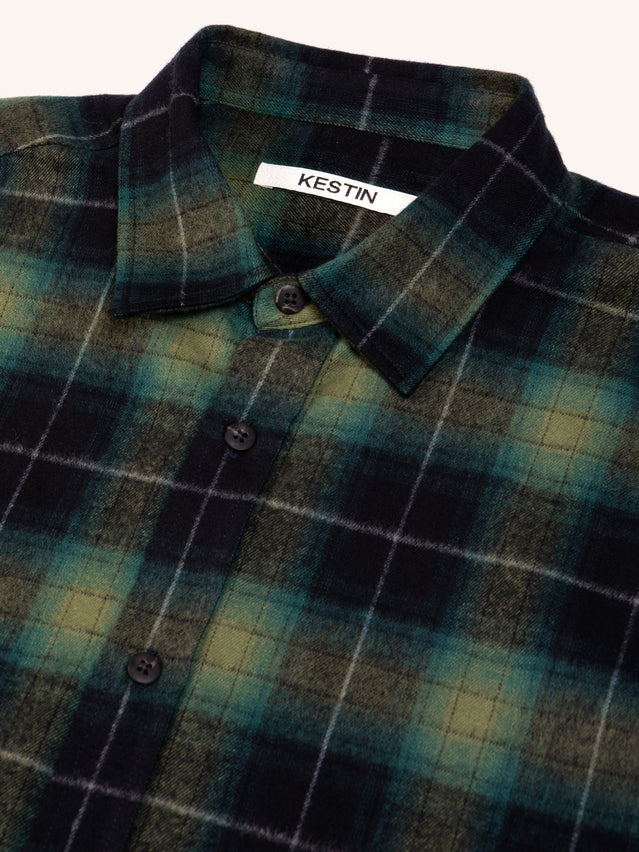 A close up of a shirt collar from the KESTIN Men's Dirleton Shirt, which is a premium Flannel Shirt is a Green Plaid Check.
