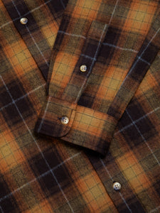A buttoned cuff from a traditional men's flannel shirt, designed in Scotland by premium menswear label KESTIN.