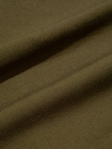 A green cotton canvas material, used to make the KESTIN Aberlour Pants.
