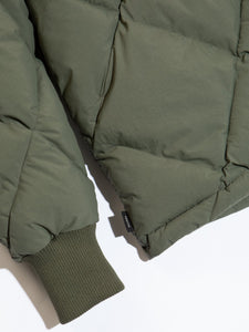 The ribbed cuff of a men's insulated jacket, based on American heritage outerwear.