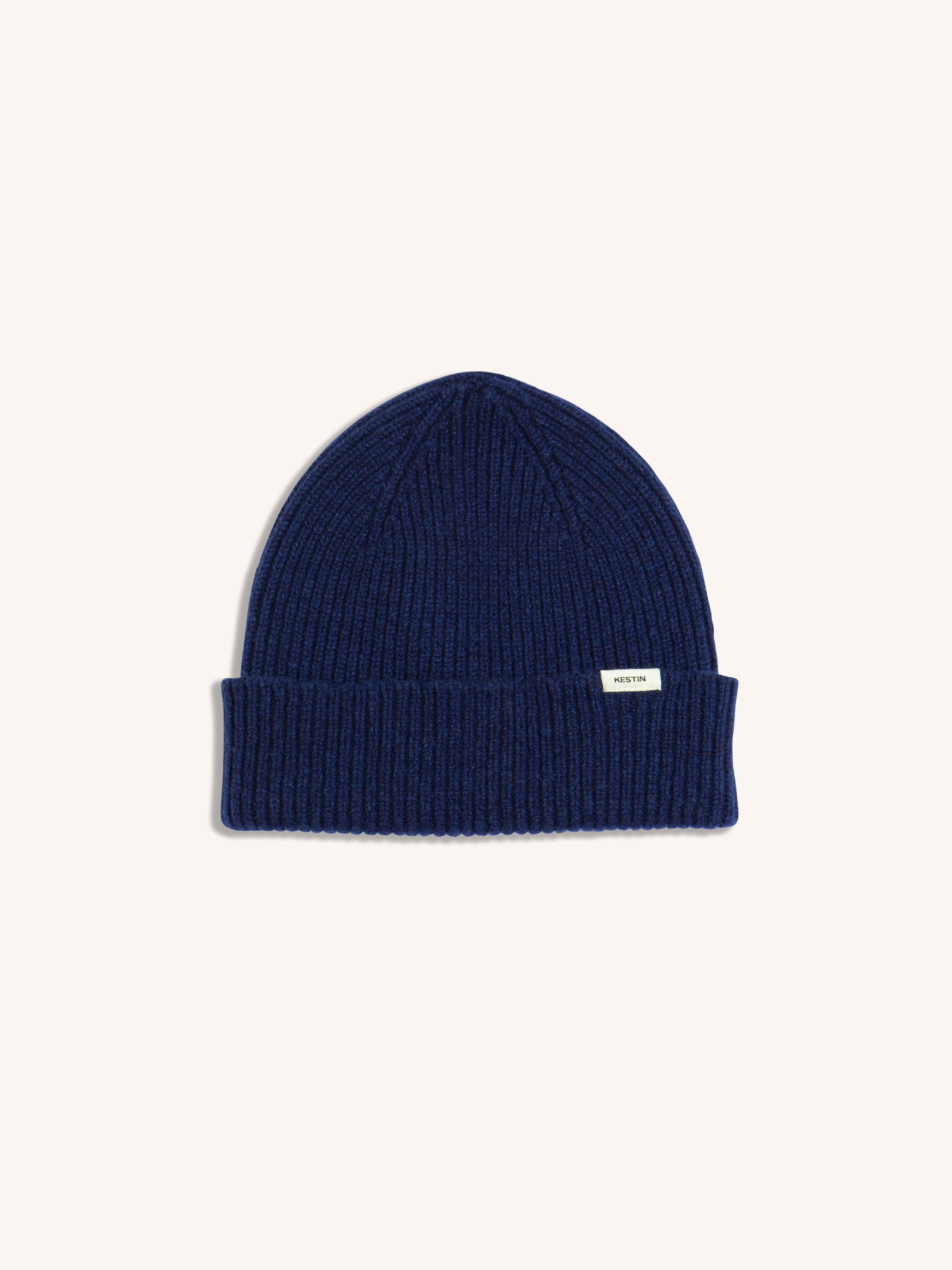 A men's lambswool beanie, made in Scotland by menswear designer KESTIN, in blue.