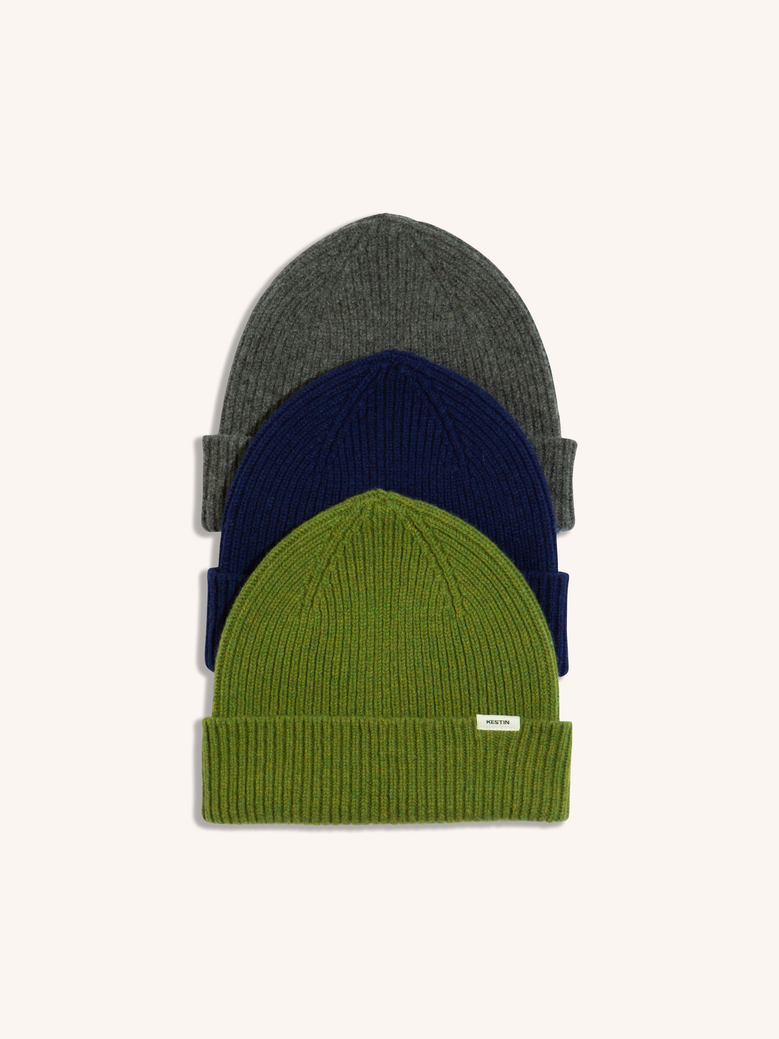 Three lambswool beanies by designer menswear brand KESTIN.