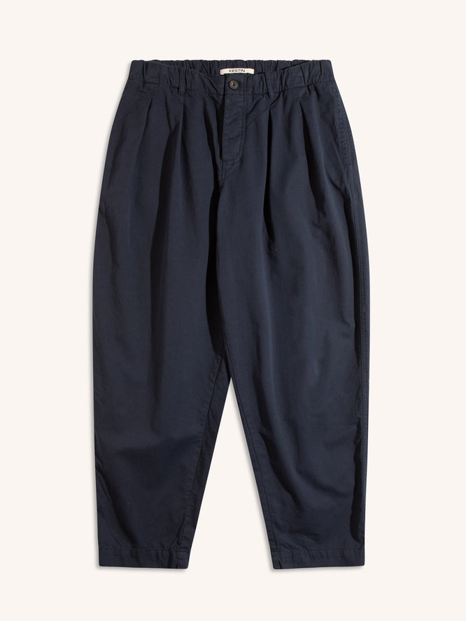 A pair of men's relaxed fit trousers in navy blue on a white background.
