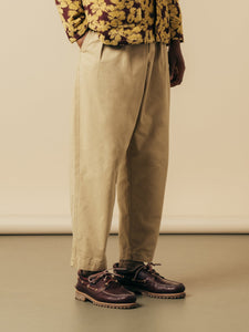 A model wearing KESTIN Clyde Pants with Timberland shoes.
