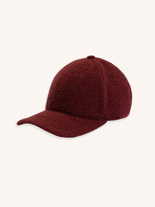 A dark red fleece cap from Scottish menswear brand KESTIN, made from a comfortable virgin wool.