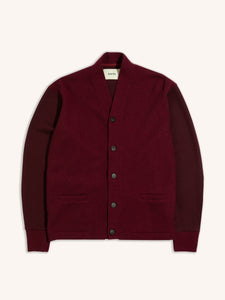 A premium men's knitted cardigan in a dark red colour.