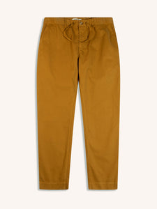 A pair of men's slim tapered fit chino trousers, in tobacco brown, on a white background.