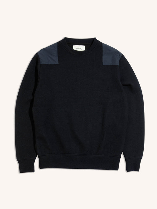 A technical knitted sweater from premium menswear brand KESTIN, made from recycled Japanese wool.