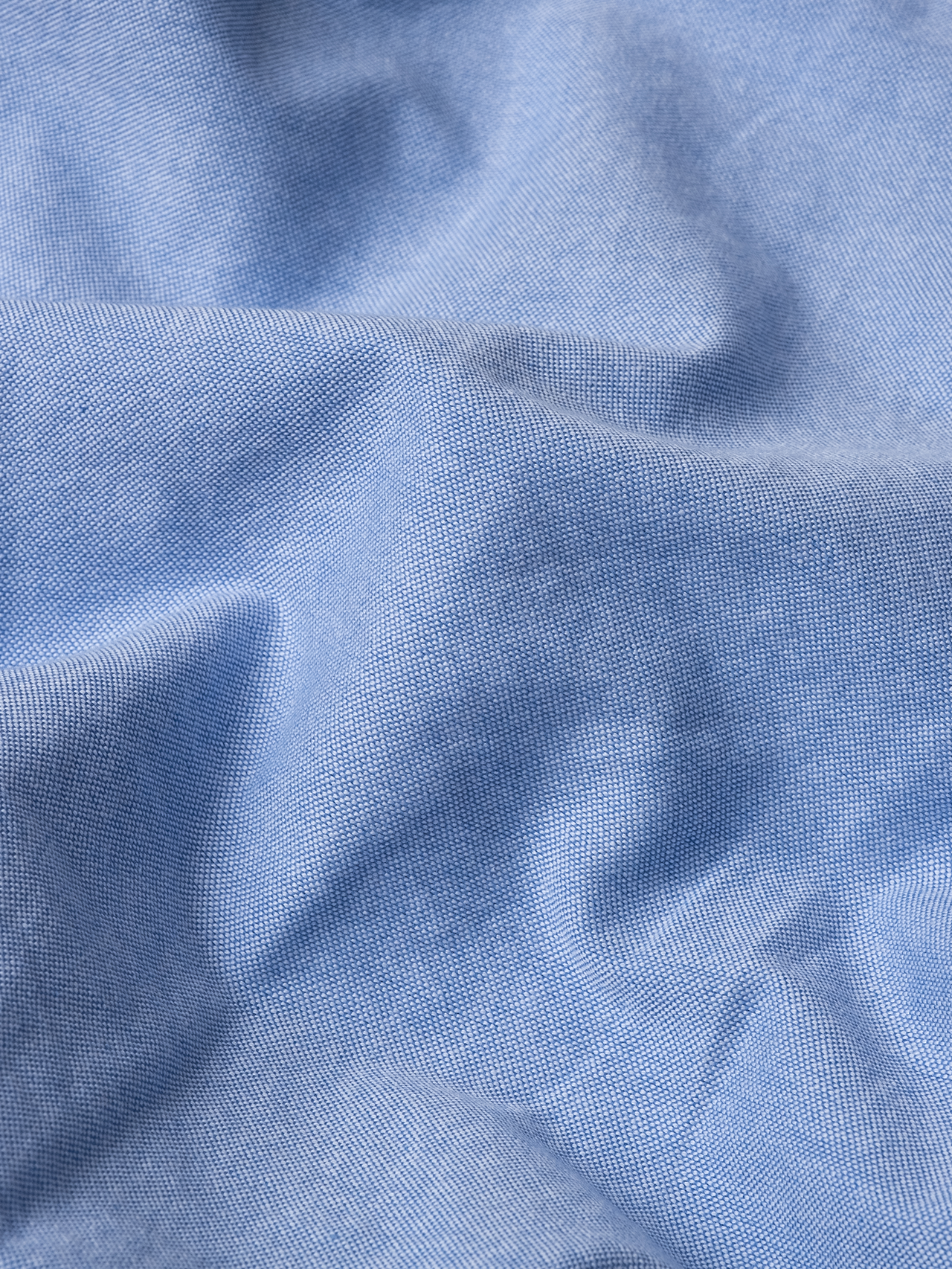 The fabric used to make a classic men's Oxford Shirt. This one is used to make the KESTIN Raeburn Button Down Shirt in a Light Blue colour.