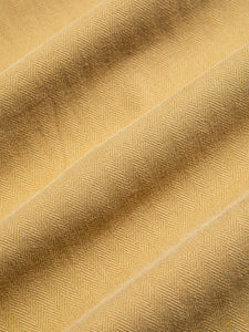A tan coloured cotton herringbone material, used to make a KESTIN Suit.