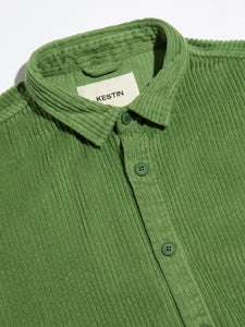 The close-up of the front and collar of the KESTIN Armadale Overshirt in green corduroy.
