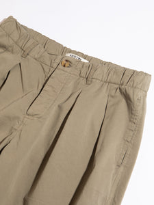 A close-up of the waistband of the KESTIN Clyde Pant in sage green.