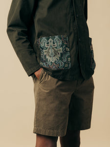 A close-up of the jacquard pattern patch pockets of the KESTIN Huntly Jacket.