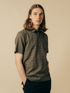 A model wearing the KESTIN Granton Shirt in Thistle Print.