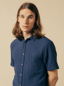 A model wearing a short sleeve shirt from Scottish premium menswear designer KESTIN.