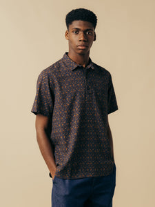 A model wearing a short sleeve pullover shirt from menswear designer KESTIN.