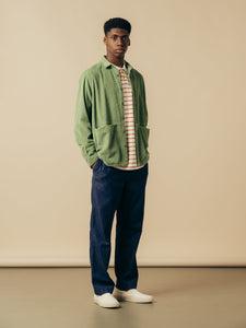 A model wearing a corduroy overshirt and denim jeans from menswear brand KESTIN.