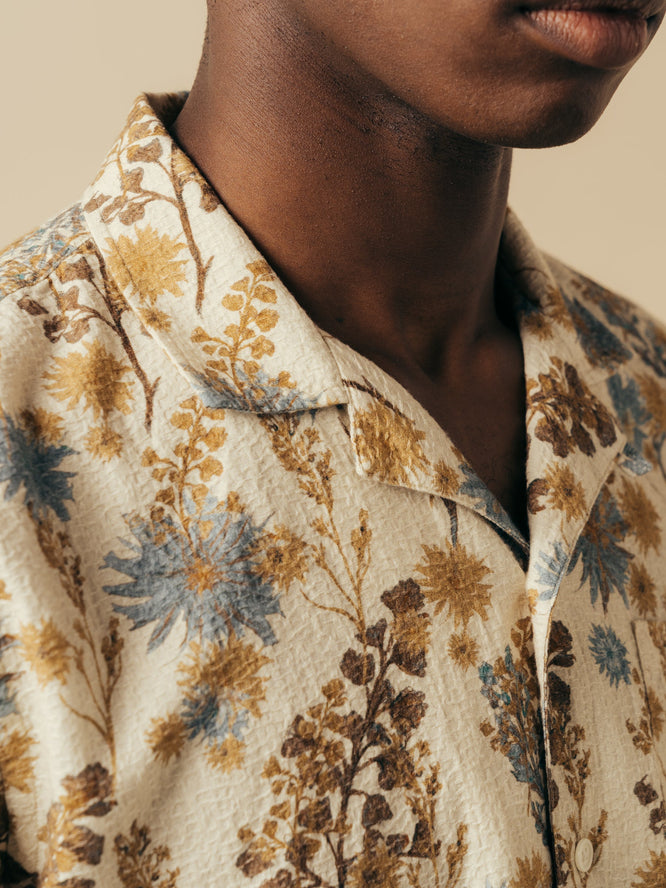 A model showing the camp collar of the KESTIN Crammond Shirt in Ecru Thistle Print.