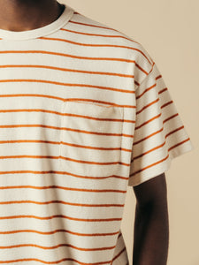 The shoulder and chest pocket of the KESTIN Fly Tee.