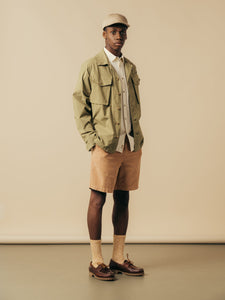A model wearing a casual outdoor-inspired spring outfit from KESTIN.