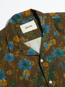 The camp collar of the KESTIN Crammond Shirt in Olive Thistle Print.