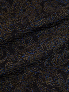 A Japanese needle cord fabric with a navy blue paisley pattern print.
