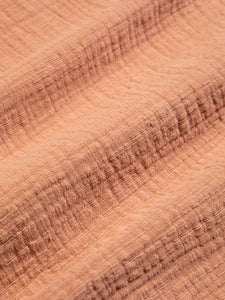 A soft, casual textured fabric, made from garment dyed cotton.