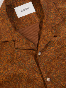 The camp collar and buttoned front of the KESTIN Crammond Shirt in a brown paisley..