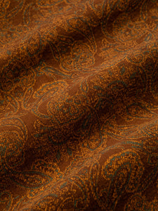 A fine corduroy material from Japan with a subtle brown paisley pattern.