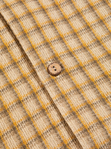 A premium woven Japanese fabric with a casual beige check pattern.