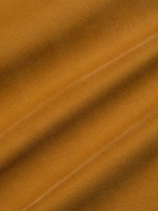 A close-up of a cotton twill material in tobacco brown, used to make the KESTIN Inverness Trouser.