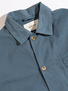 A close-up of the collar of the KESTIN Huntly Jacket in French Blue.