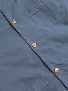 Buttons up the front of the KESTIN Huntly Jacket in French Blue Herringbone.