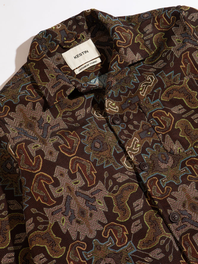 A close-up of the KESTIN Ormiston Jacket in Wine Red Jacquard.