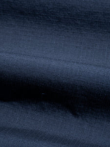 A navy blue ripstop fabric, used by KESTIN for their SS24 Collection.