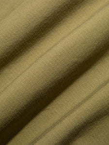 A military green fabric made from 100% cotton ripstop.