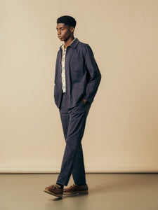 A man wearing clothing from the KESTIN SS24 Collection.