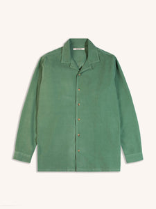 A long sleeve shirt with an open collar, dyed in green, on a white background.