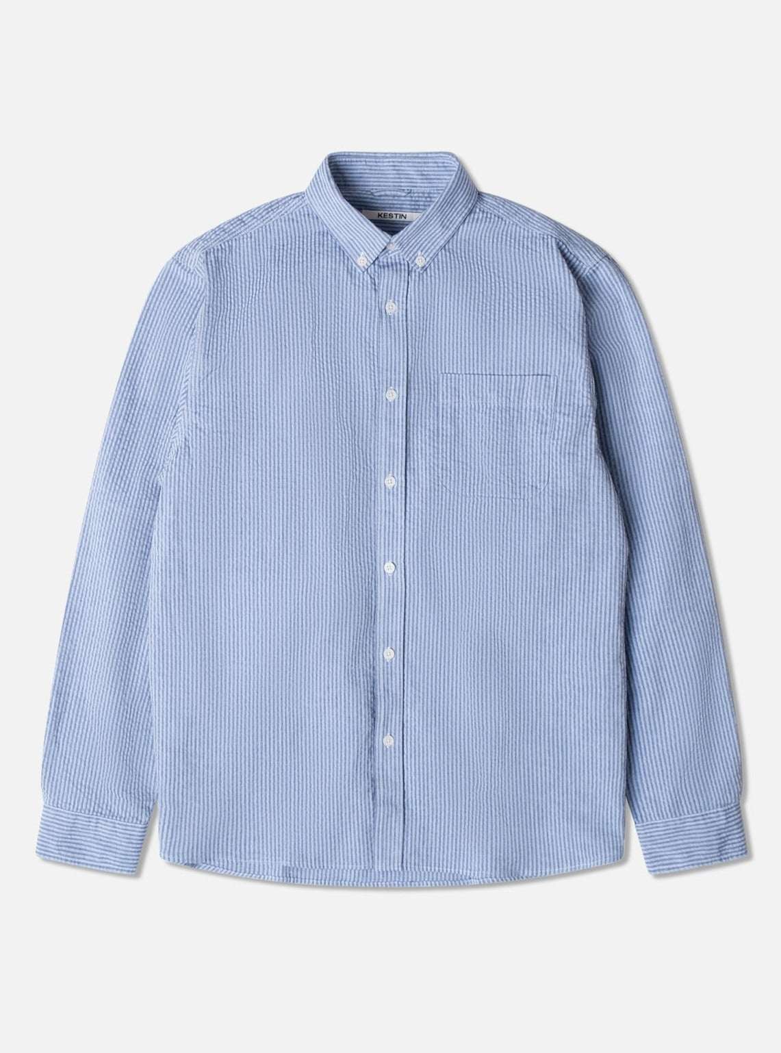 This is a long sleeve shirt by designer menswear brand KESTIN. The Raeburn Button Down Shirt is made from a traditional striped Cotton Seersucker.