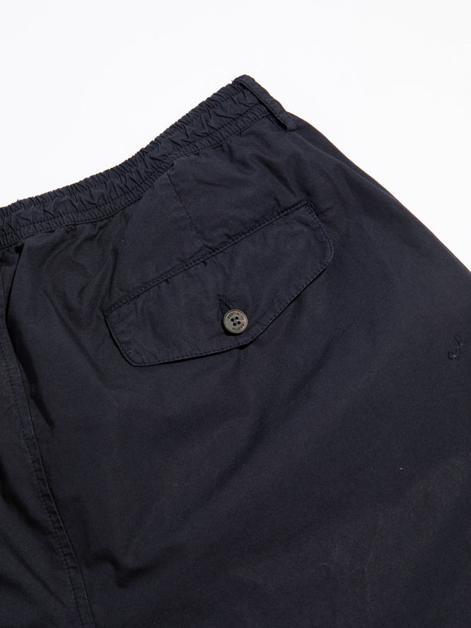 The back pocket of the KESTIN Clyde Pant in navy blue.