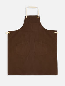 A workwear apron from Scottish brand KESTIN made from a durable cotton canvas.